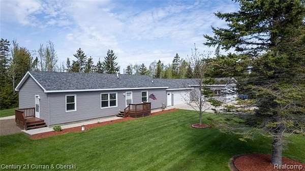11 Acres of Recreational Land with Home for Sale in Presque Isle Township, Michigan