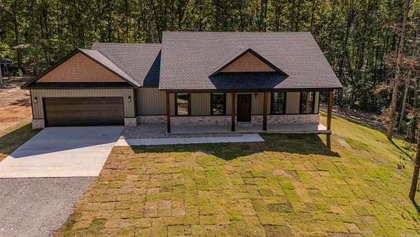 4.29 Acres of Land with Home for Sale in Bauxite, Arkansas