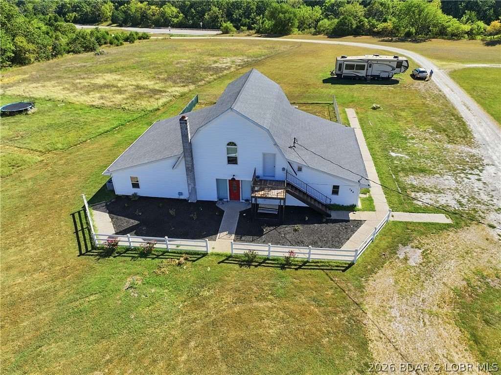 1.83 Acres of Land with Home for Sale in Macks Creek, Missouri