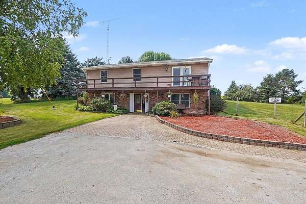 4 Acres of Land with Home for Sale in Grant, Michigan