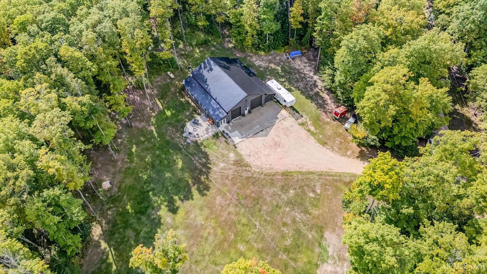 5.38 Acres of Land with Home for Sale in Curtis, Michigan