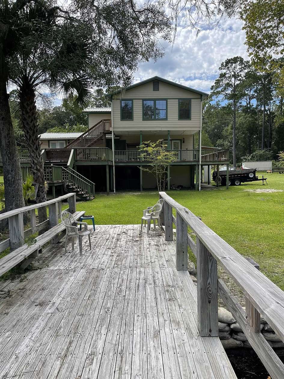 1.56 Acres of Land with Home for Sale in Crawfordville, Florida