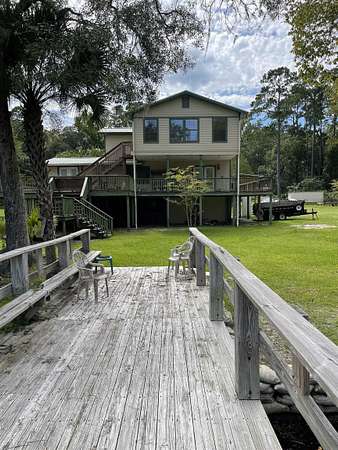 1.56 Acres of Land with Home for Sale in Crawfordville, Florida