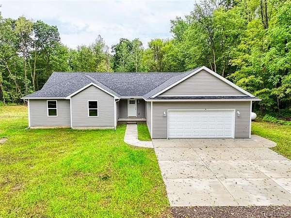 2 Acres of Land with Home for Sale in Conway Township, Michigan