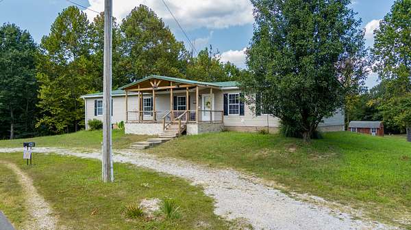 4.76 Acres of Land with Home for Sale in Edmonton, Kentucky