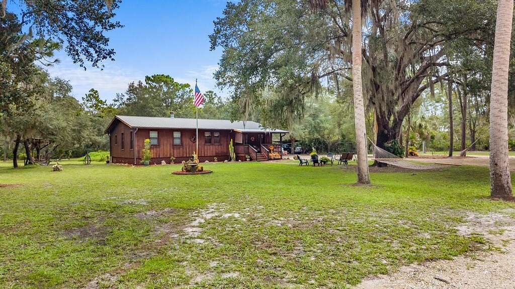 11.5 Acres of Land with Home for Sale in Inglis, Florida