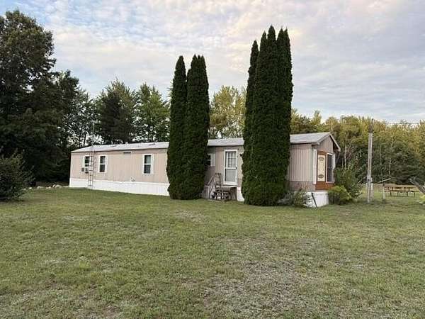 2.1 Acres of Land with Home for Sale in Sand Lake, Michigan
