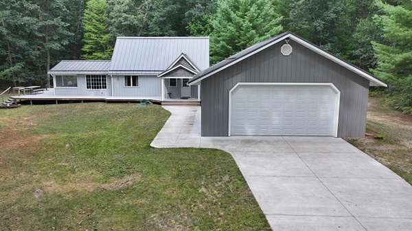 2.85 Acres of Land with Home for Sale in Irons, Michigan