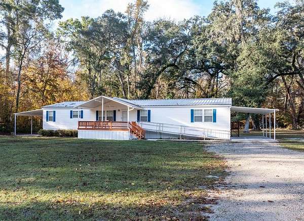 1.84 Acres of Land with Home for Sale in Fort White, Florida