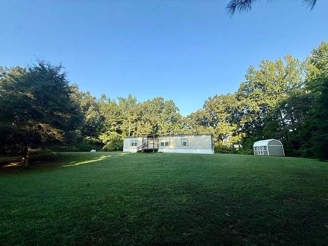 4 Acres of Land with Home for Sale in Paris, Tennessee