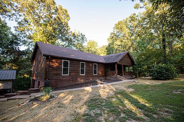 8.66 Acres of Land with Home for Sale in Lyles, Tennessee