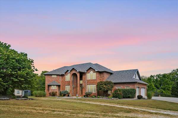 10 Acres of Land with Home for Sale in Bolivar, Missouri