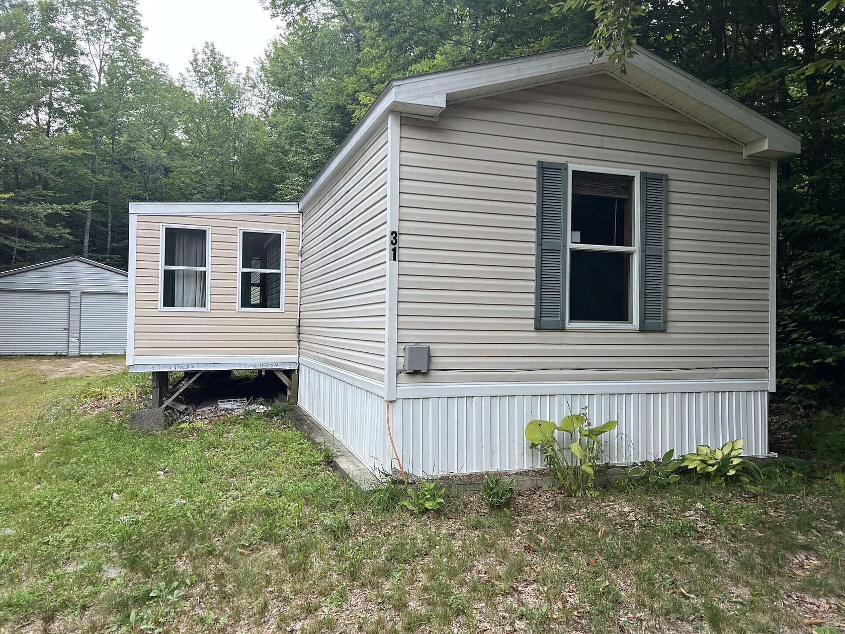 1.5 Acres of Land with Home for Sale in Dixfield, Maine