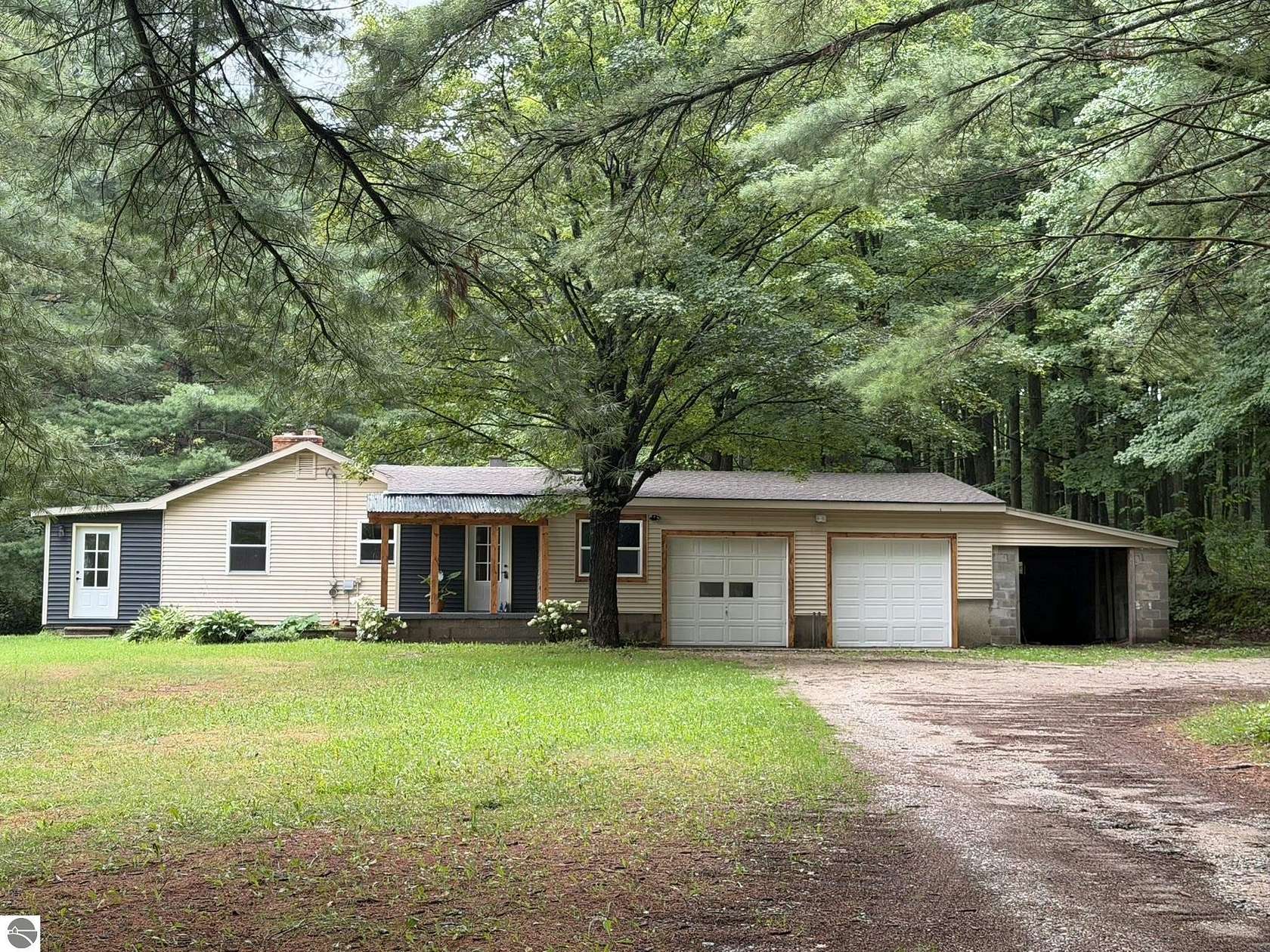 5 Acres of Land with Home for Sale in Manton, Michigan