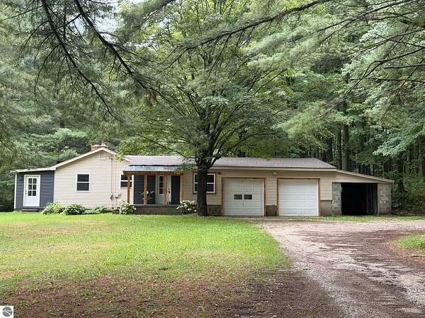 5 Acres of Land with Home for Sale in Manton, Michigan