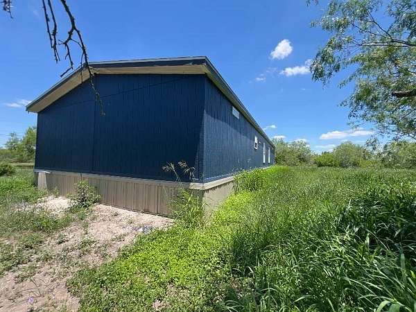 1.77 Acres of Land with Home for Sale in Orange Grove, Texas