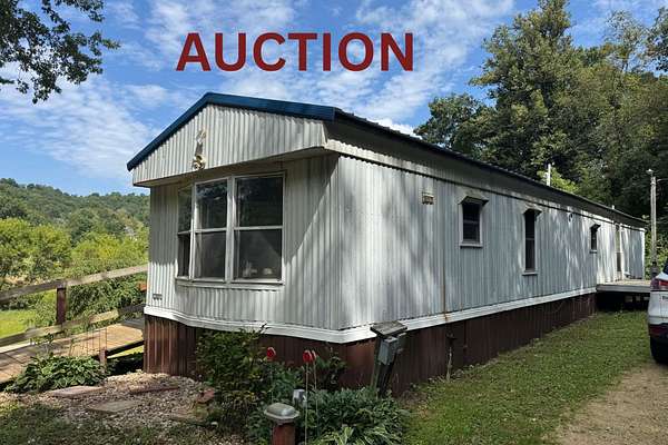 4.83 Acres of Land with Home for Auction in Hill Point, Wisconsin