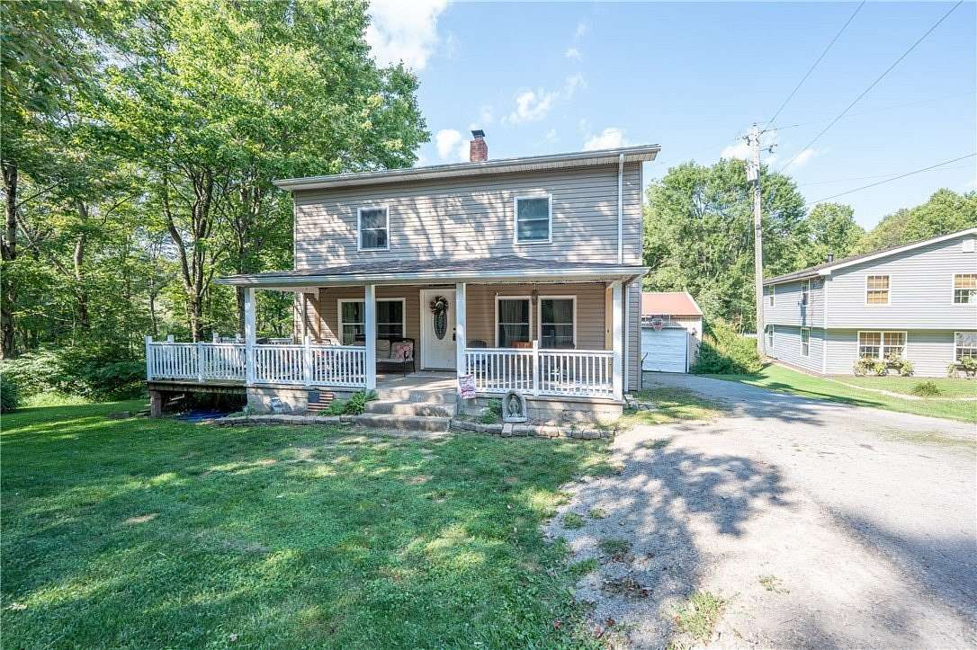9.8 Acres of Land with Home for Sale in Latrobe, Pennsylvania
