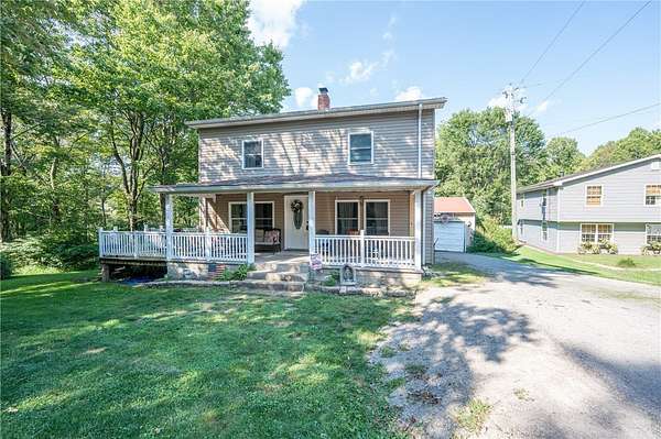 9.8 Acres of Land with Home for Sale in Latrobe, Pennsylvania