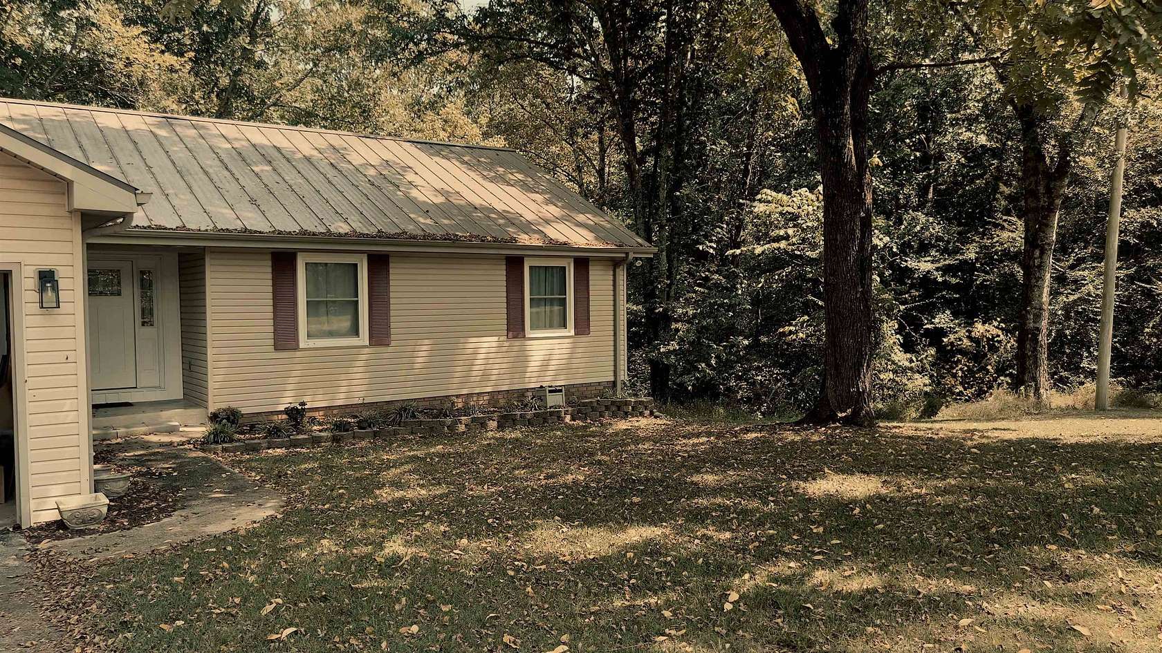 9.38 Acres of Land with Home for Sale in Russellville, Alabama
