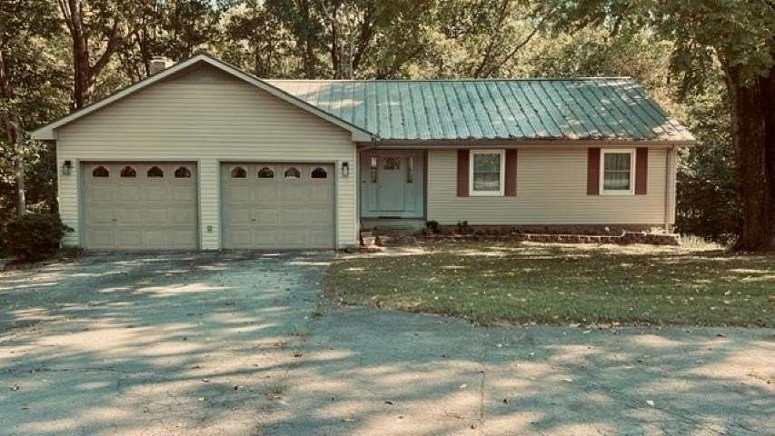 9.38 Acres of Land with Home for Sale in Russellville, Alabama
