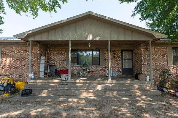 4.54 Acres of Land with Home for Sale in Gans, Oklahoma