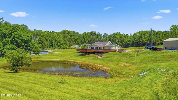 15.1 Acres of Land with Home for Sale in Vonore, Tennessee