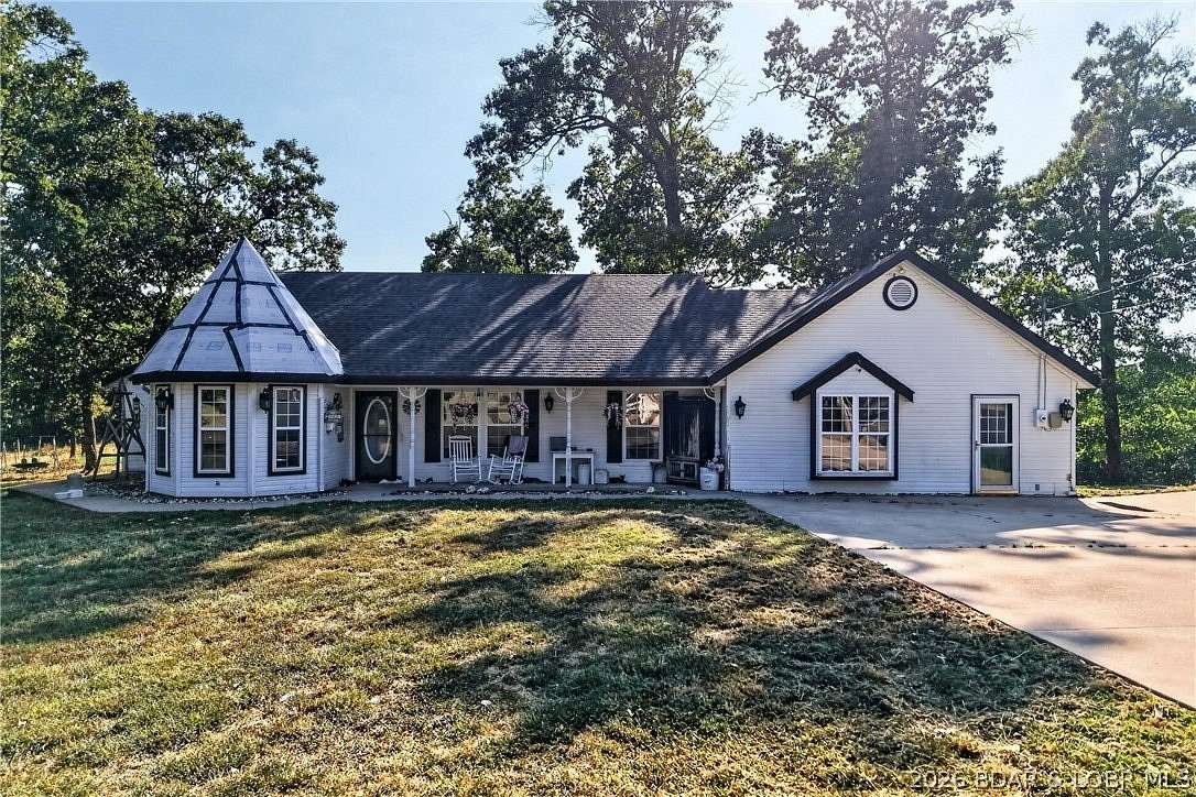 11.9 Acres of Land with Home for Sale in Camdenton, Missouri