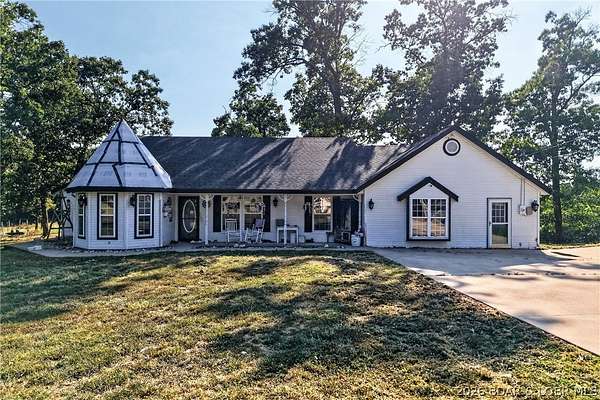 11.9 Acres of Land with Home for Sale in Camdenton, Missouri