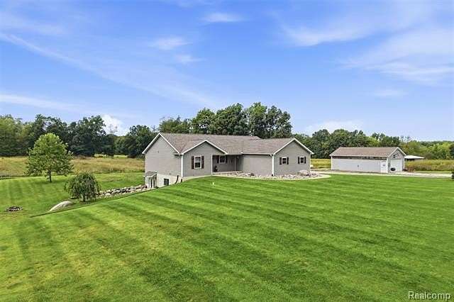 3.18 Acres of Land with Home for Sale in Tyrone Township, Michigan