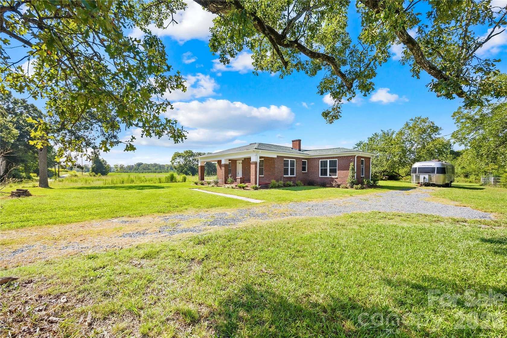 9.48 Acres of Land with Home for Sale in Midland, North Carolina