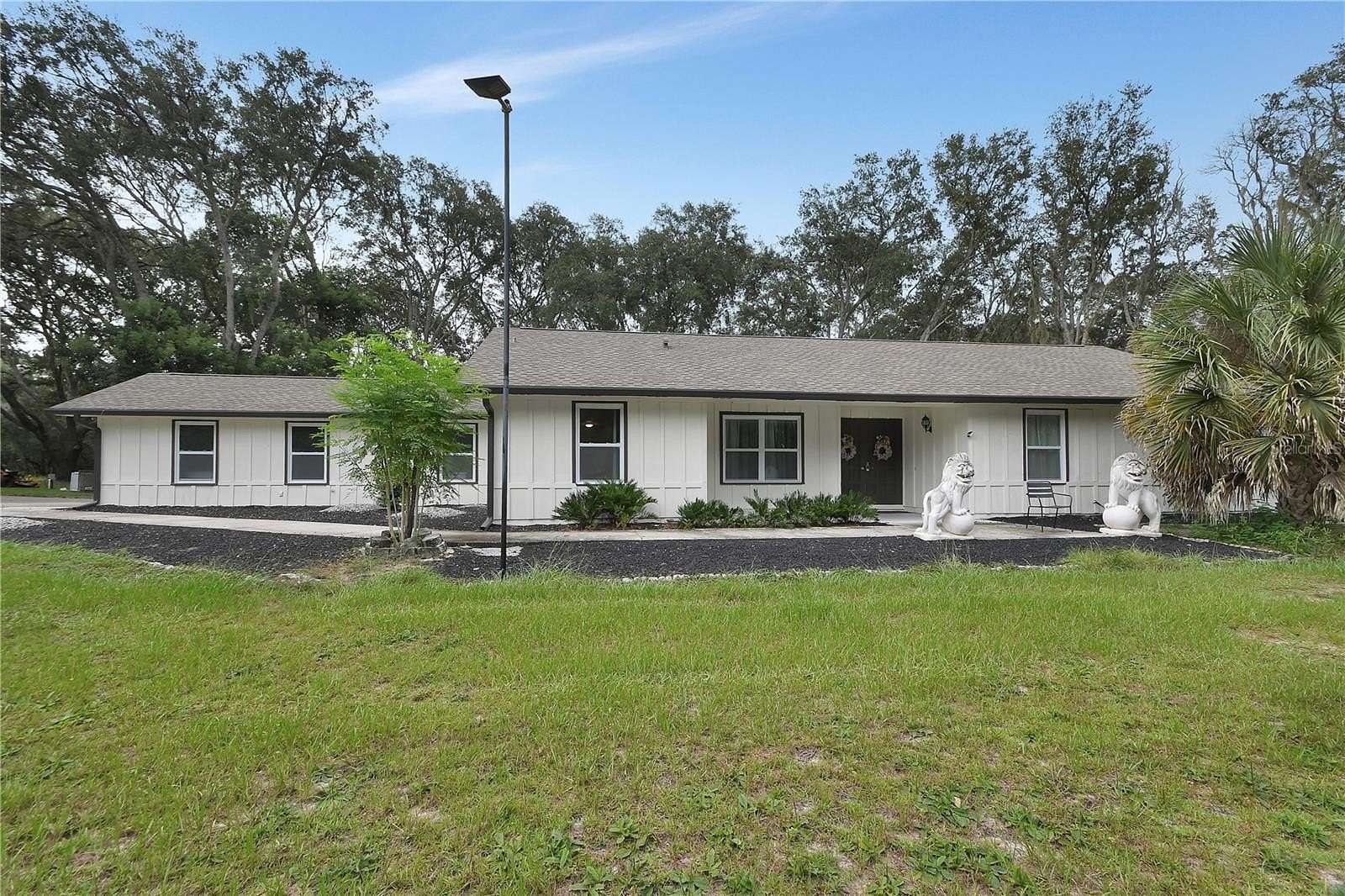 2.63 Acres of Land with Home for Sale in Orange City, Florida