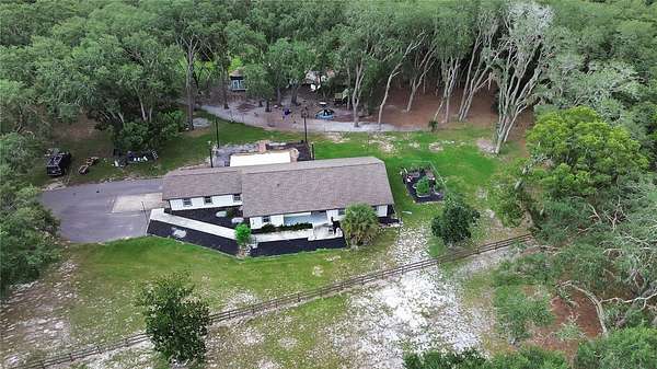 2.63 Acres of Land with Home for Sale in Orange City, Florida