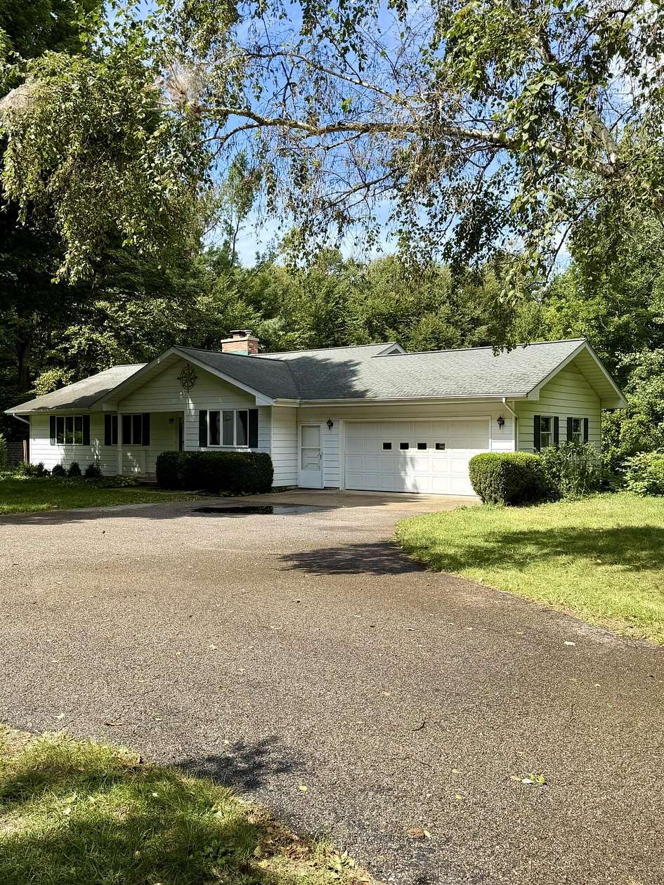2.27 Acres of Land with Home for Sale in Onekama, Michigan