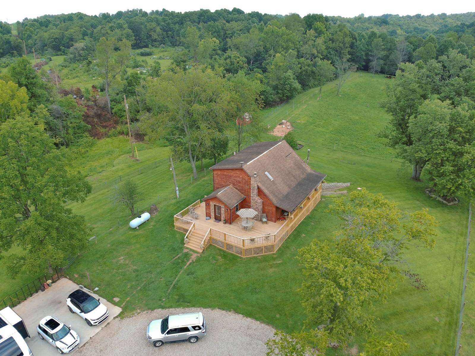 69.5 Acres of Land with Home for Sale in Vincent, Ohio