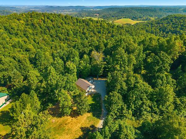 90 Acres of Land with Home for Sale in Middleburg, Kentucky