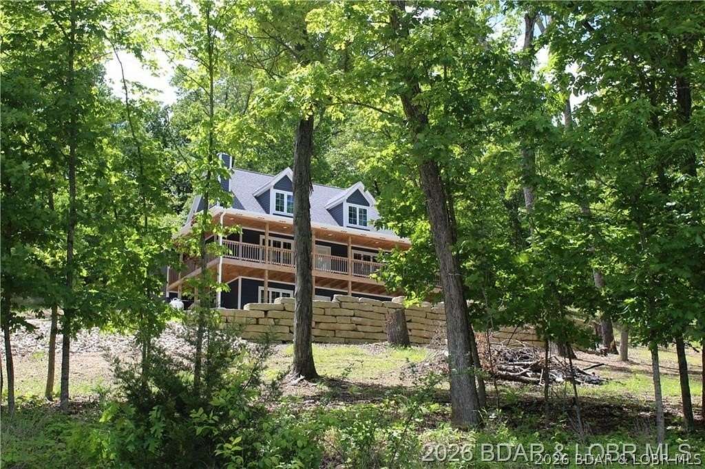 17.4 Acres of Recreational Land with Home for Sale in Gravois Mills, Missouri