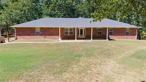 7.4 Acres of Land with Home for Sale in Seligman, Missouri