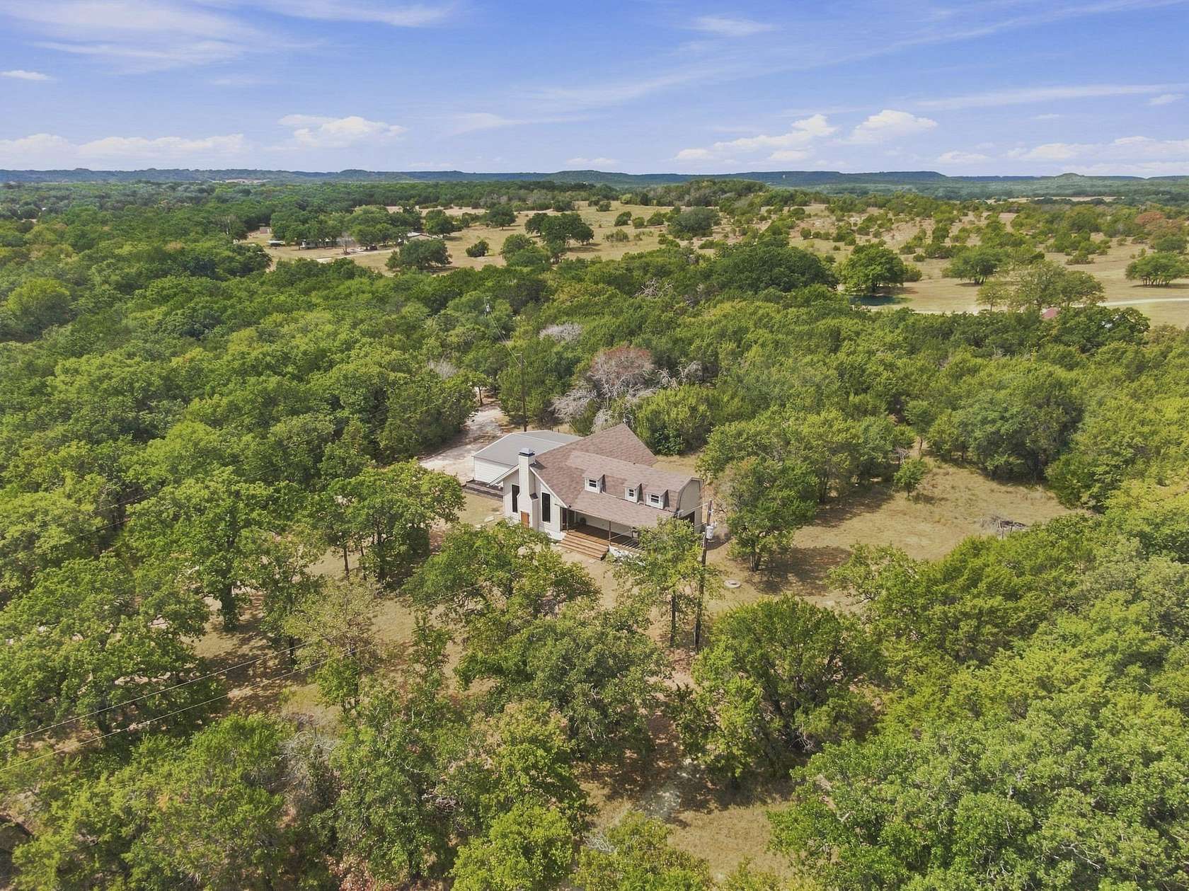 4.2 Acres of Land with Home for Sale in Glen Rose, Texas