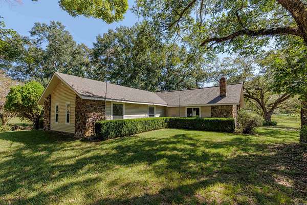 29 Acres of Land with Home for Sale in Perryville, Arkansas