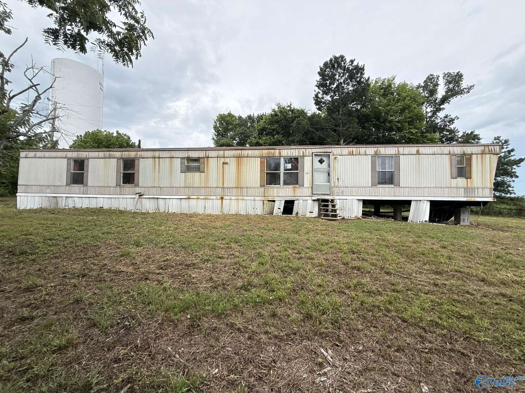 2.8 Acres of Land with Home for Sale in Flat Rock, Alabama