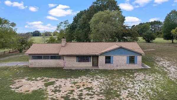 30.4 Acres of Agricultural Land with Home for Sale in Henderson, Texas