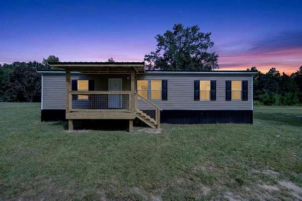 1.83 Acres of Land with Home for Sale in McIntyre, Georgia