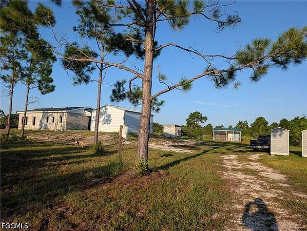 5 Acres of Land with Home for Sale in Punta Gorda, Florida