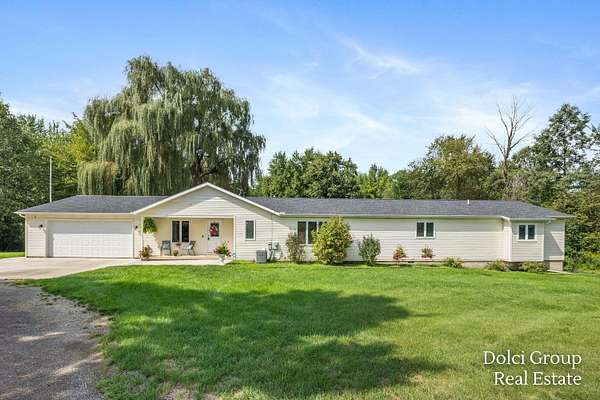 5 Acres of Land with Home for Sale in Casnovia, Michigan