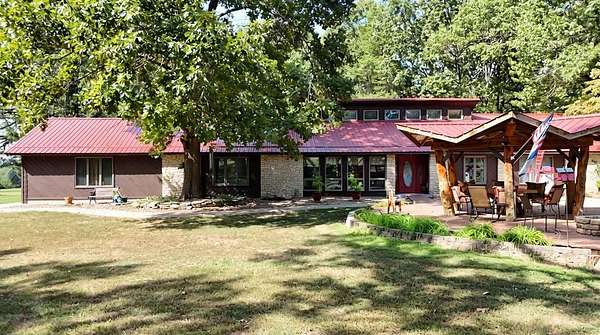 7.59 Acres of Land with Home for Sale in Golden, Missouri
