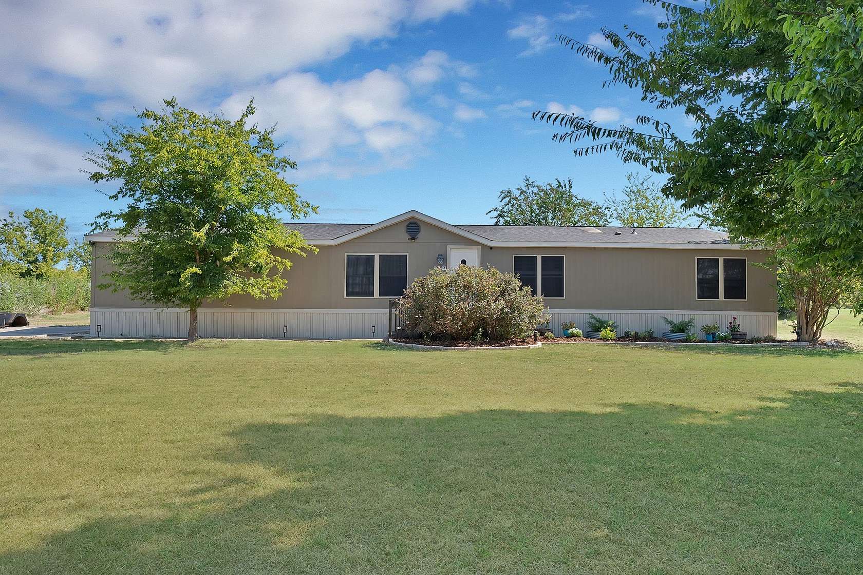 2.48 Acres of Land with Home for Sale in Royse City, Texas
