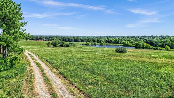 66 Acres of Land with Home for Sale in Savoy, Texas