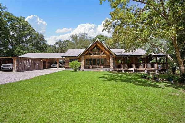 7.4 Acres of Land with Home for Sale in Semmes, Alabama