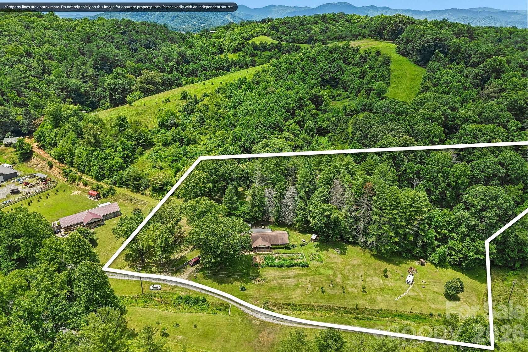 3.52 Acres of Land with Home for Sale in Marshall, North Carolina
